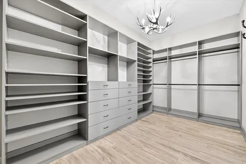 a view of a porch with furniture and garden