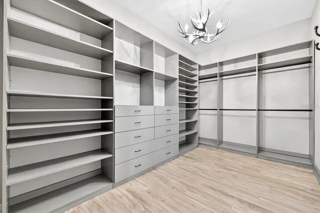 a view of a porch with furniture and garden