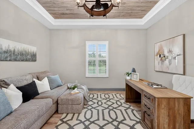 a view of a patio with couches chairs and a big yard