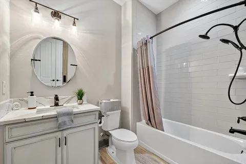 a view of house with swimming pool outdoor seating