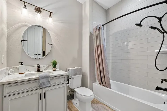 a view of house with swimming pool outdoor seating