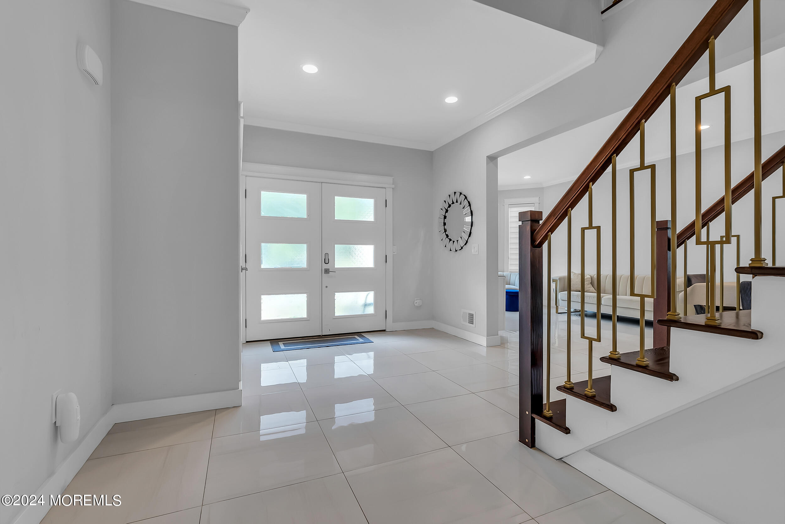 8 Sarah Lane Eatontown, NJ 07724 - Photo 12 of 53 a view of an entryway with wooden floor and door