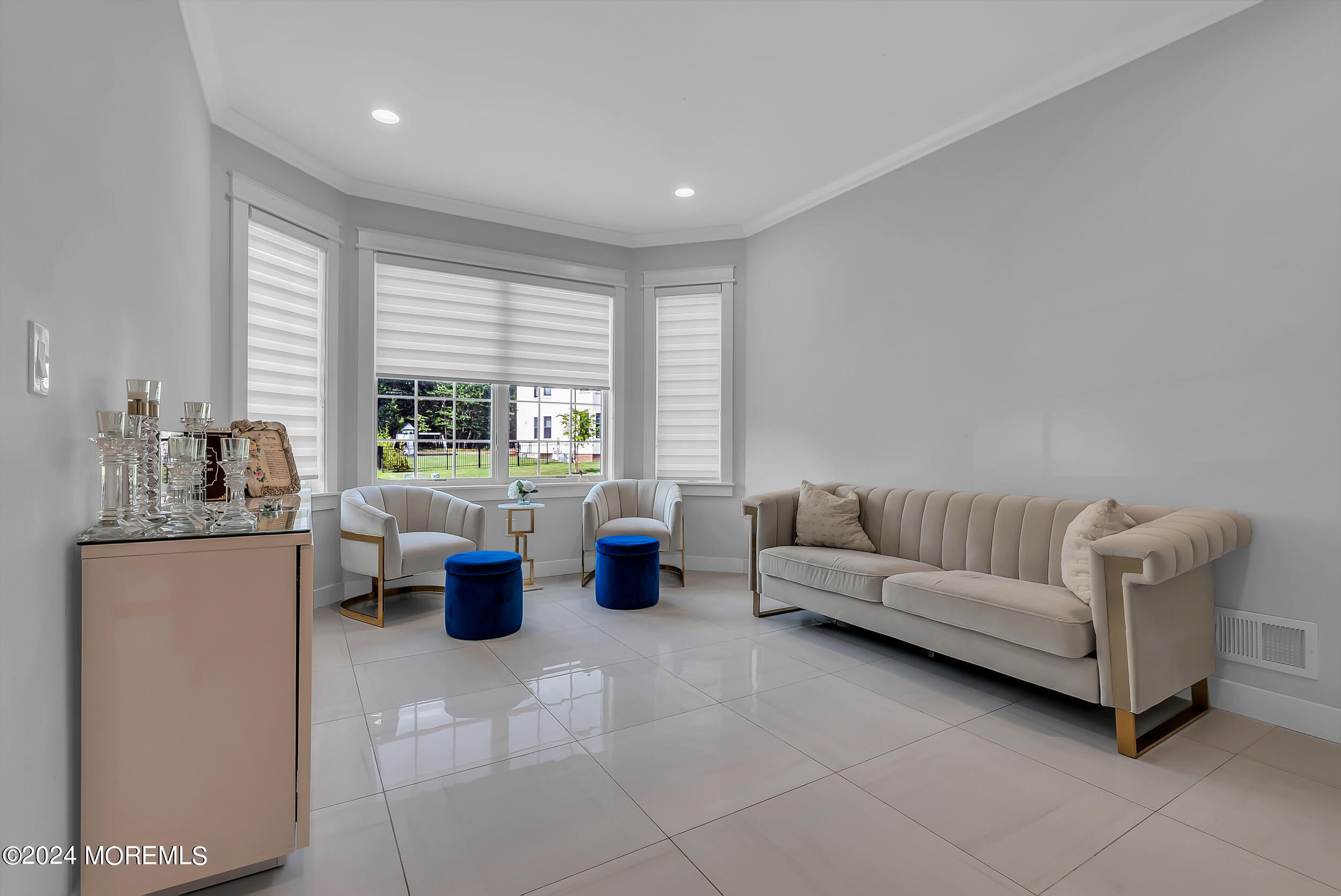 8 Sarah Lane Eatontown, NJ 07724 - Photo 14 of 53 a living room with furniture and large windows