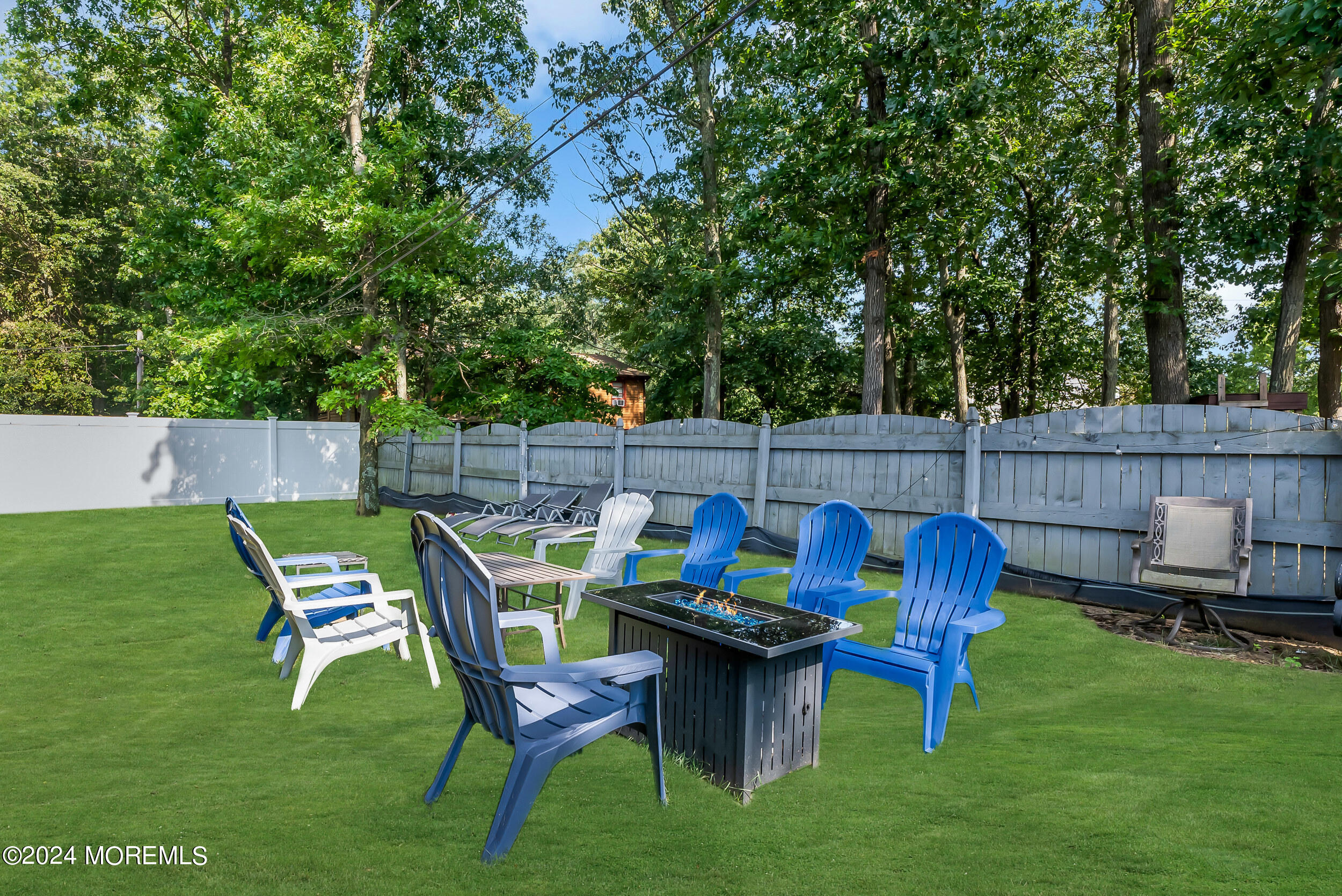 8 Sarah Lane Eatontown, NJ 07724 - Photo 2 of 53 a backyard of a house with table and chairs