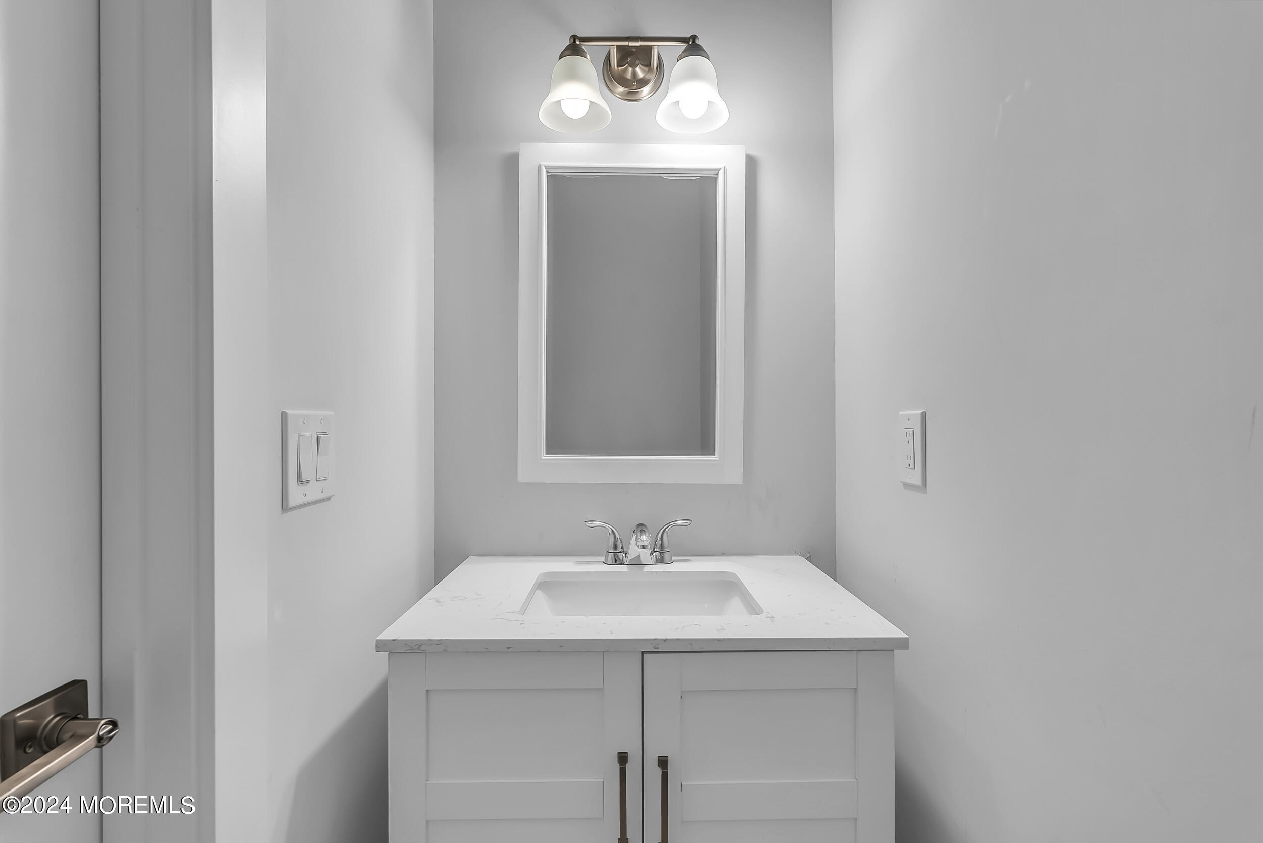 8 Sarah Lane Eatontown, NJ 07724 - Photo 23 of 53 a bathroom with a sink and a mirror