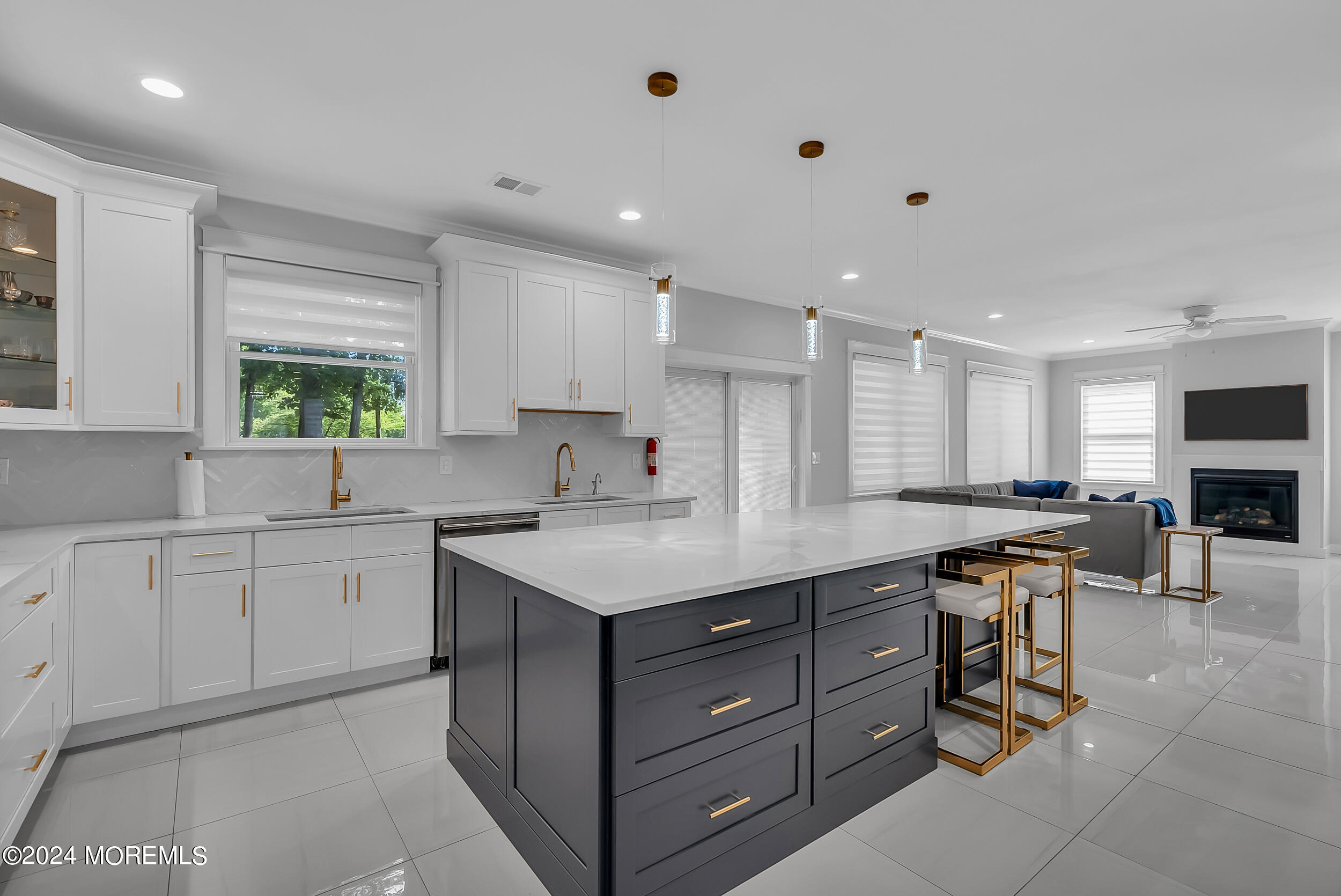 8 Sarah Lane Eatontown, NJ 07724 - Photo 37 of 53 a kitchen with a sink window and cabinets