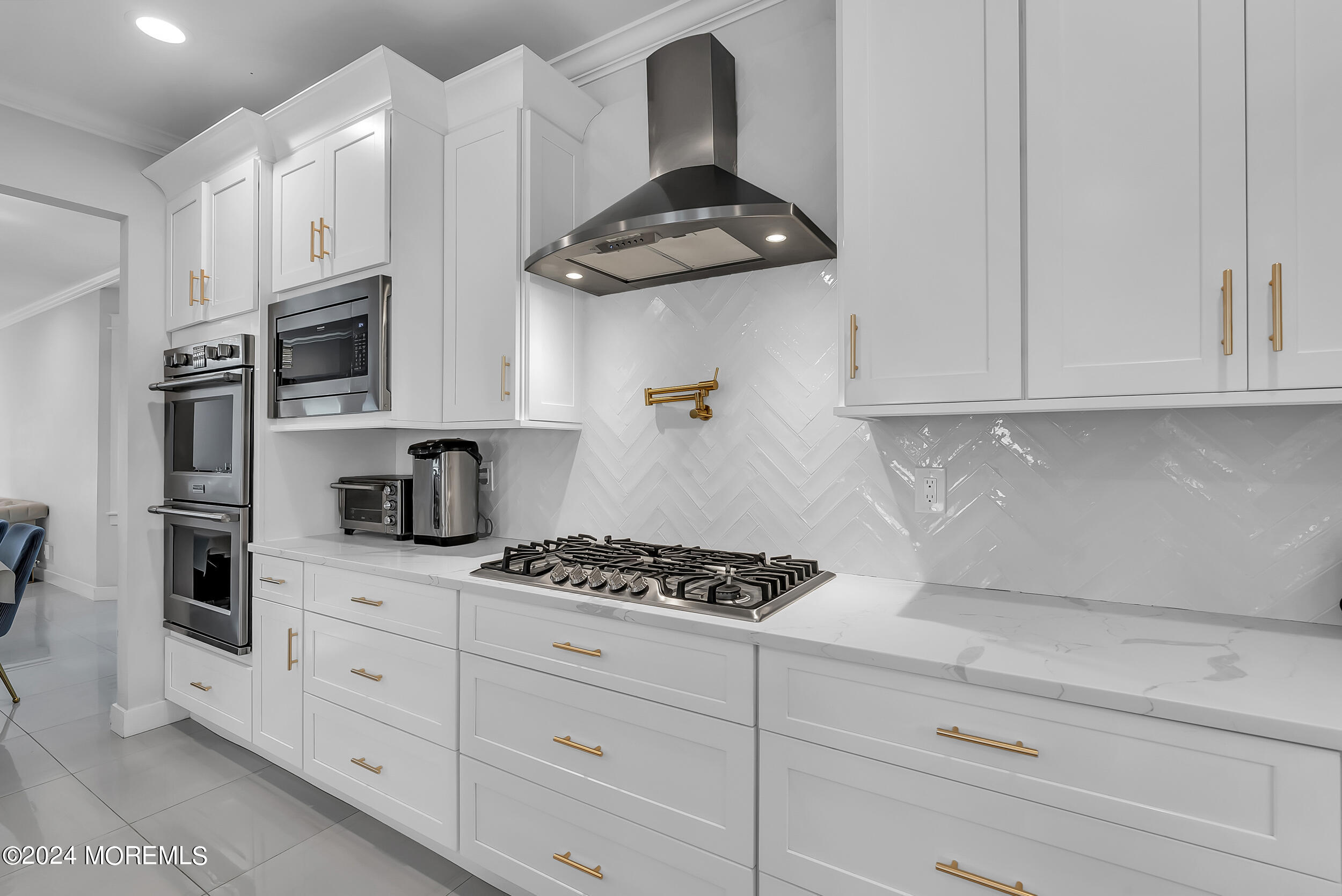 8 Sarah Lane Eatontown, NJ 07724 - Photo 39 of 53 a kitchen with white cabinets and appliances