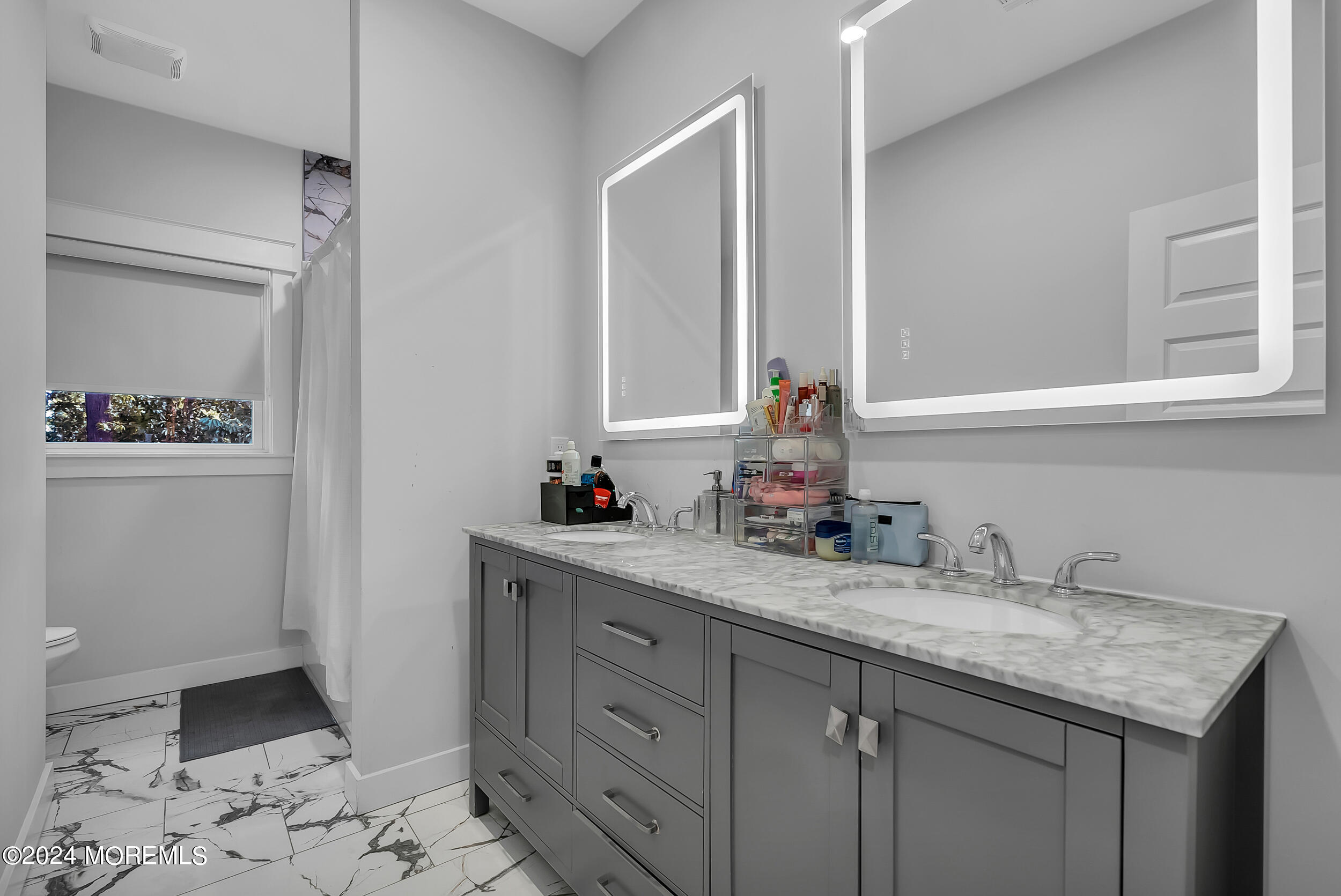 8 Sarah Lane Eatontown, NJ 07724 - Photo 44 of 53 a bathroom with a granite countertop sink and a mirror