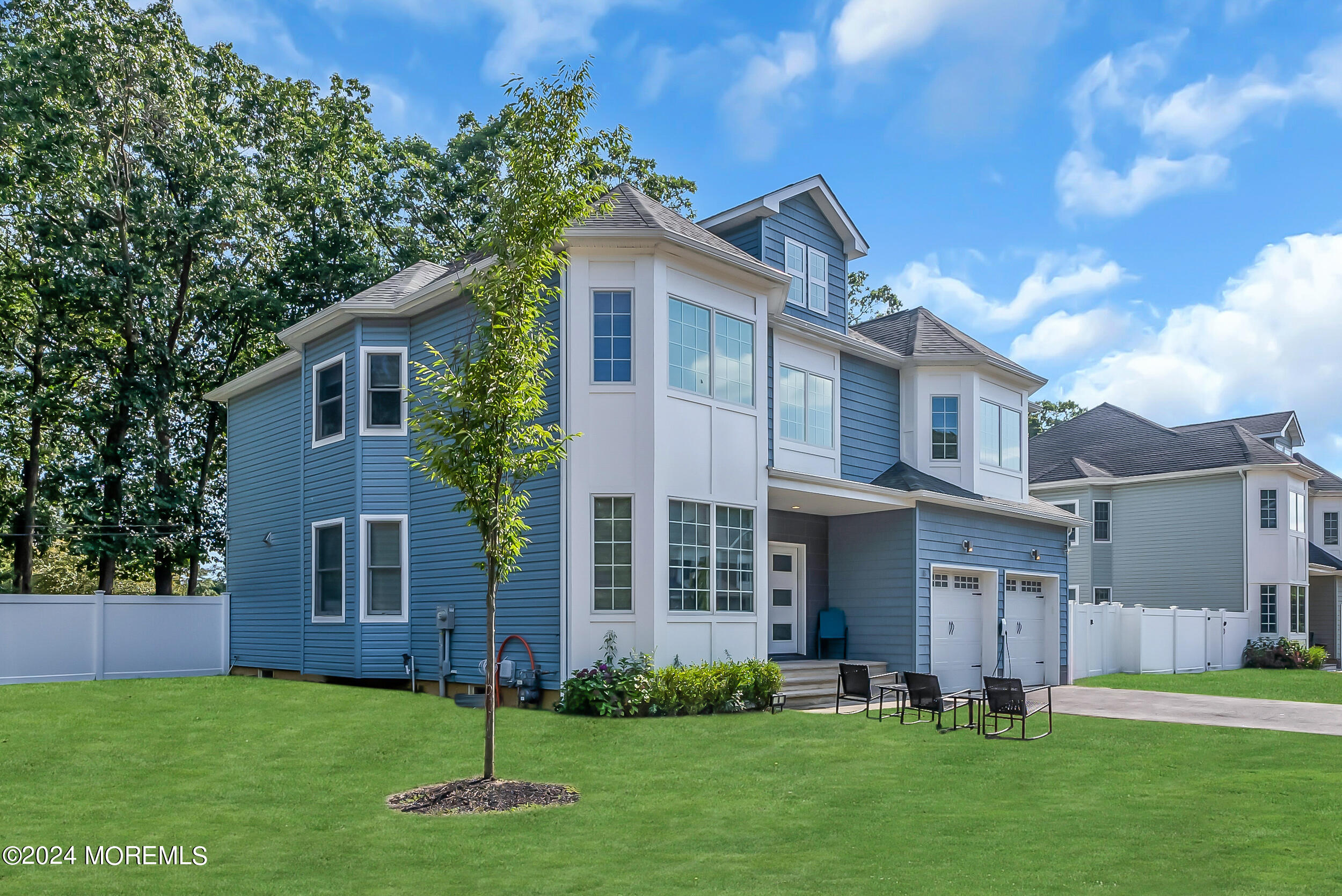 8 Sarah Lane Eatontown, NJ 07724 - Photo 6 of 53 a front view of a house with a yard
