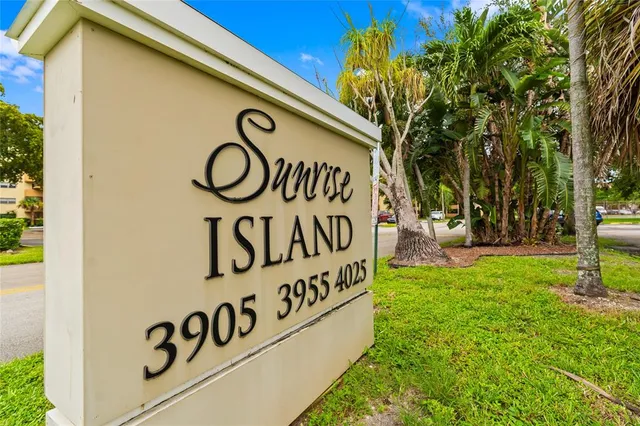 a sign on a pole on a street