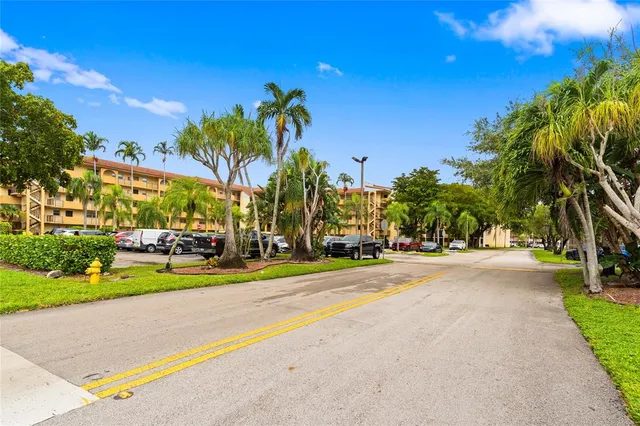 a view of a playground with basketball court