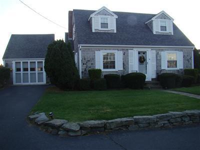 34 Benedict Road Bourne, MA 02532 - Photo 1 of 16 a backyard of a house with lots of green space