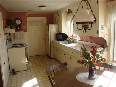 34 Benedict Road Bourne, MA 02532 - Photo 13 of 16 a spacious bathroom with a granite countertop sink a mirror and shower