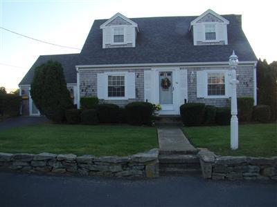 34 Benedict Road Bourne, MA 02532 - Photo 15 of 16 a front view of a house with a garden