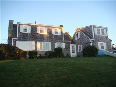 34 Benedict Road Bourne, MA 02532 - Photo 3 of 16 a front view of a house with a garden