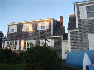 34 Benedict Road Bourne, MA 02532 - Photo 8 of 16 a front view of a house with a yard
