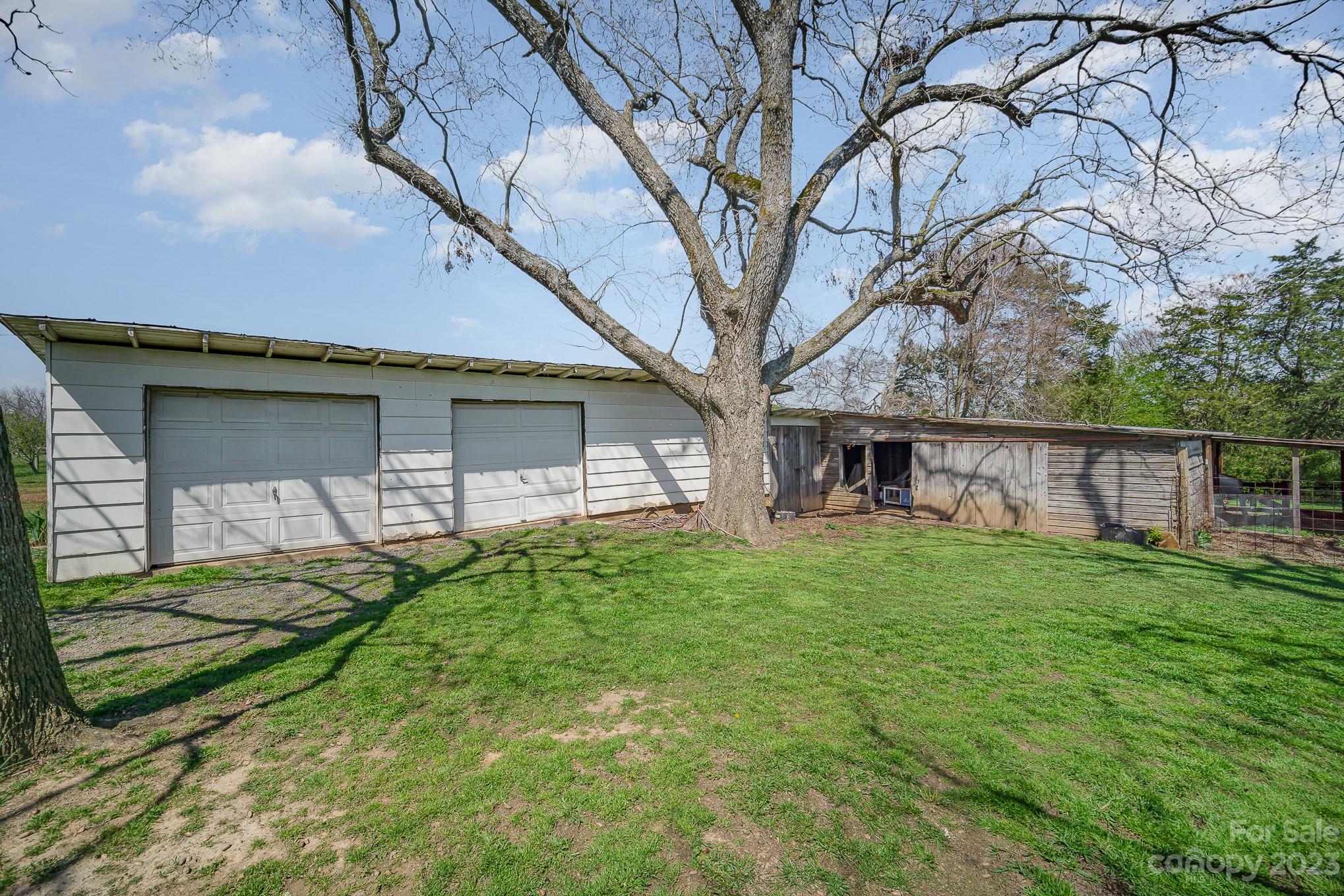 898 Hilltop Road Oakboro, NC 28129 - Photo 12 of 34 a view of a house with backyard