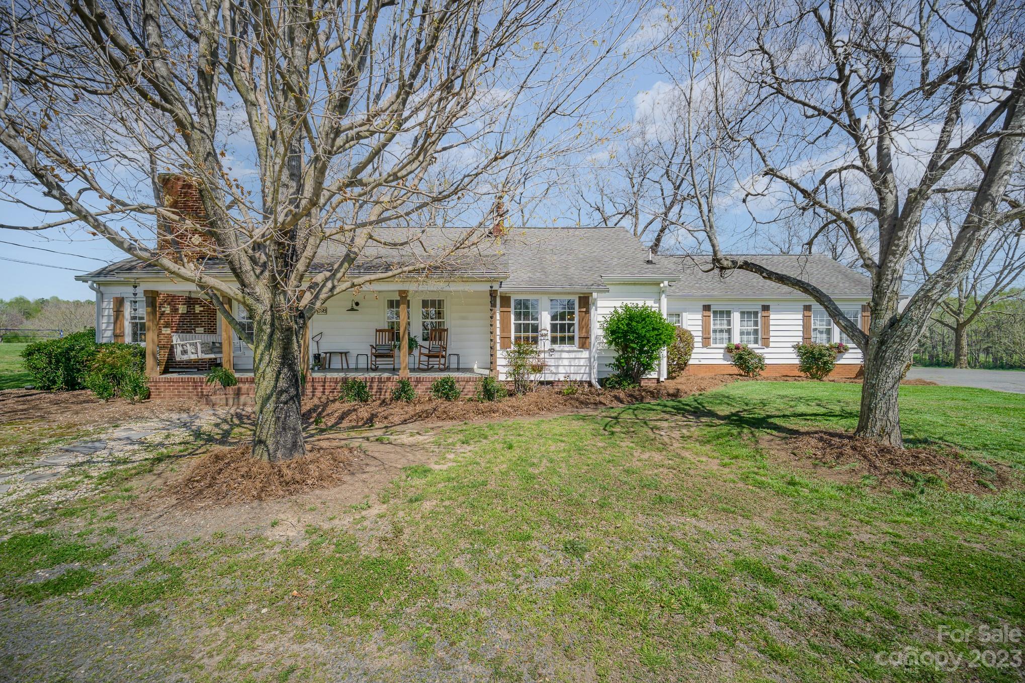 898 Hilltop Road Oakboro, NC 28129 - Photo 13 of 34 a view of a yard in front of house
