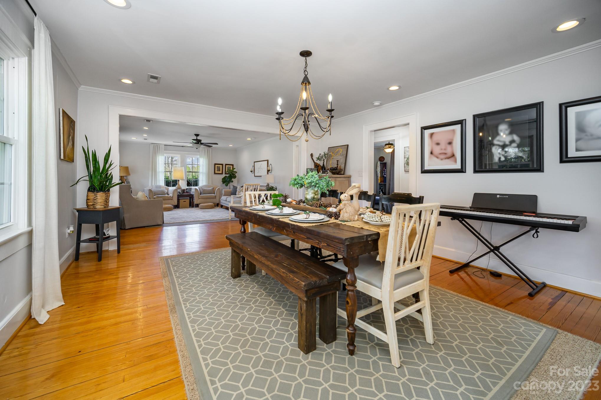898 Hilltop Road Oakboro, NC 28129 - Photo 19 of 34 a view of a dining room with furniture