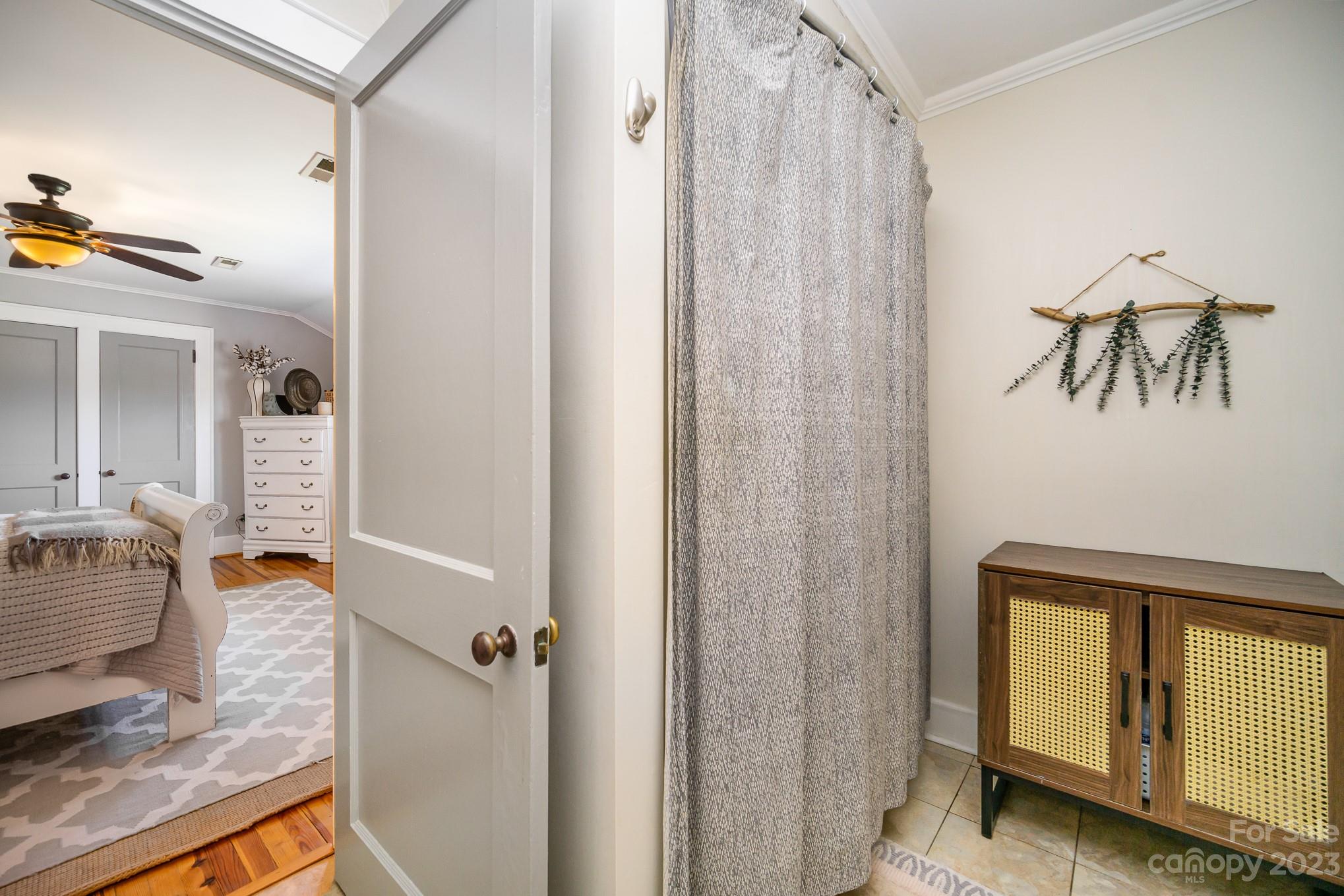 898 Hilltop Road Oakboro, NC 28129 - Photo 28 of 34 a view of a bathroom with a tub and shower