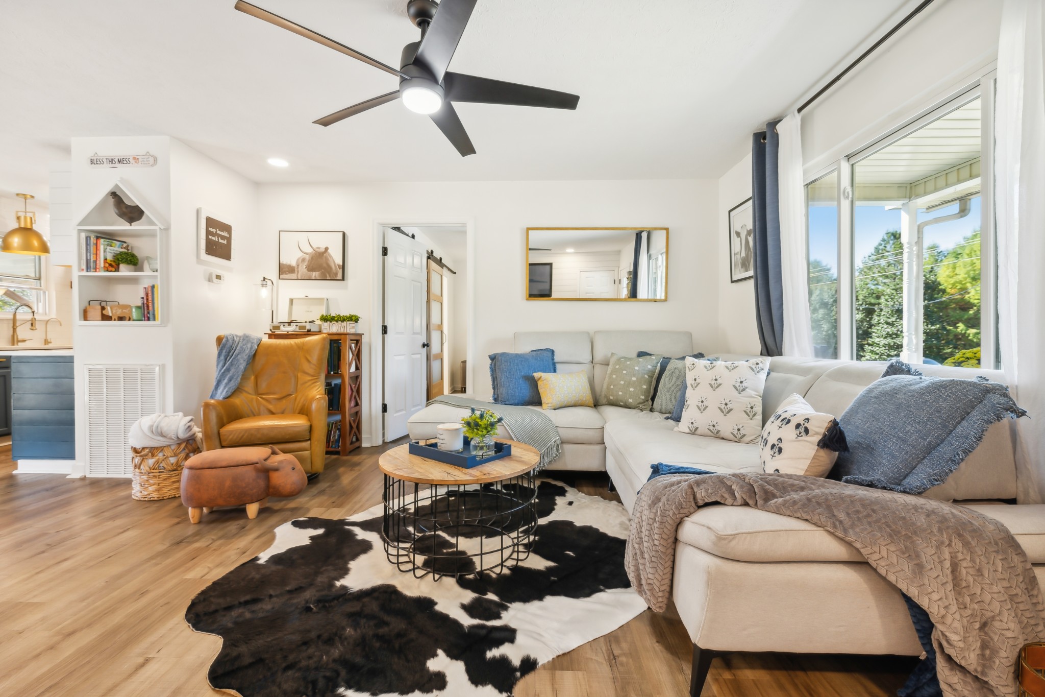 240 Hester Road Portland, TN 37148 - Photo 12 of 51 a living room with furniture ceiling fan and a rug