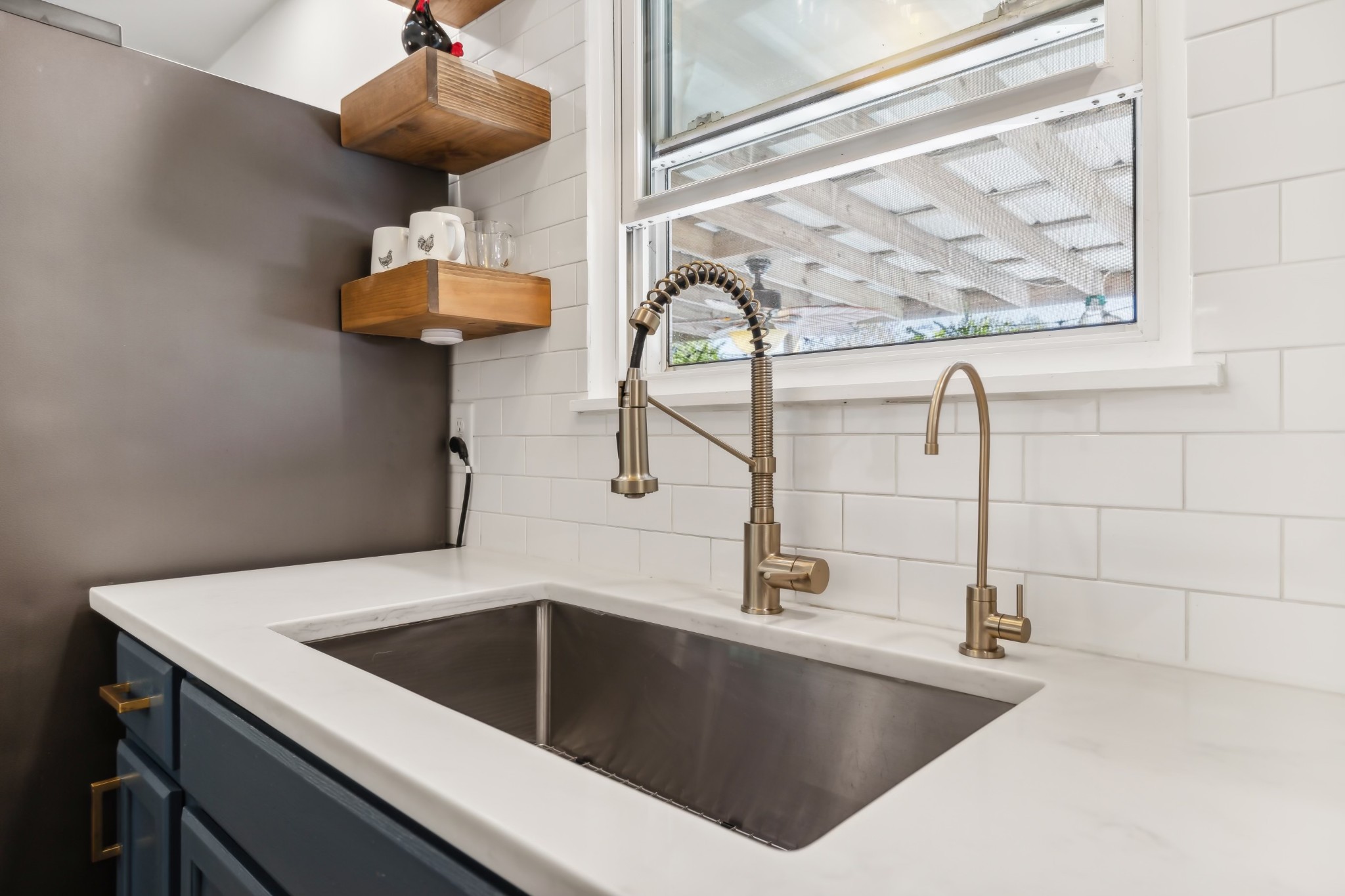 240 Hester Road Portland, TN 37148 - Photo 20 of 51 a view of a faucet a sink and dishwasher in a kitchen