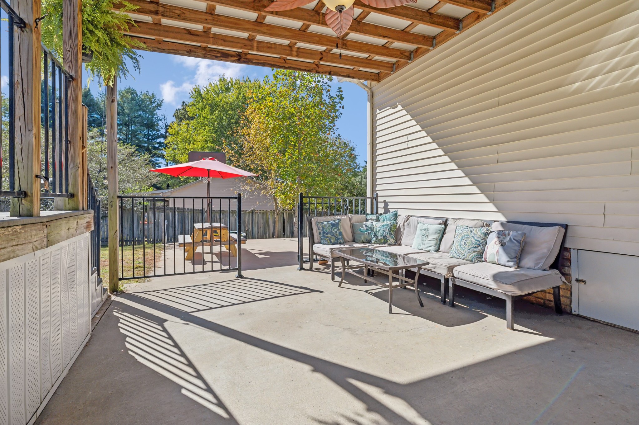 240 Hester Road Portland, TN 37148 - Photo 34 of 51 a view of a patio with a table and chairs