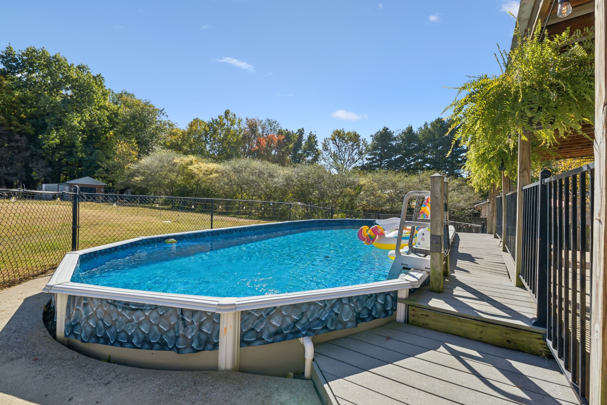 240 Hester Road Portland, TN 37148 - Photo 37 of 51 a view of a swimming pool with a patio and a yard