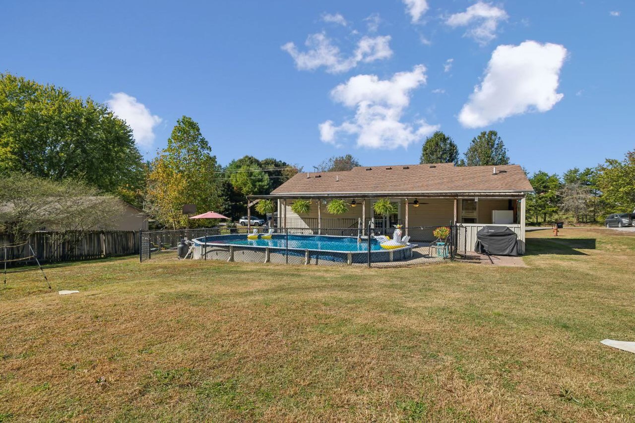 240 Hester Road Portland, TN 37148 - Photo 50 of 51 a view of a house with swimming pool and sitting area