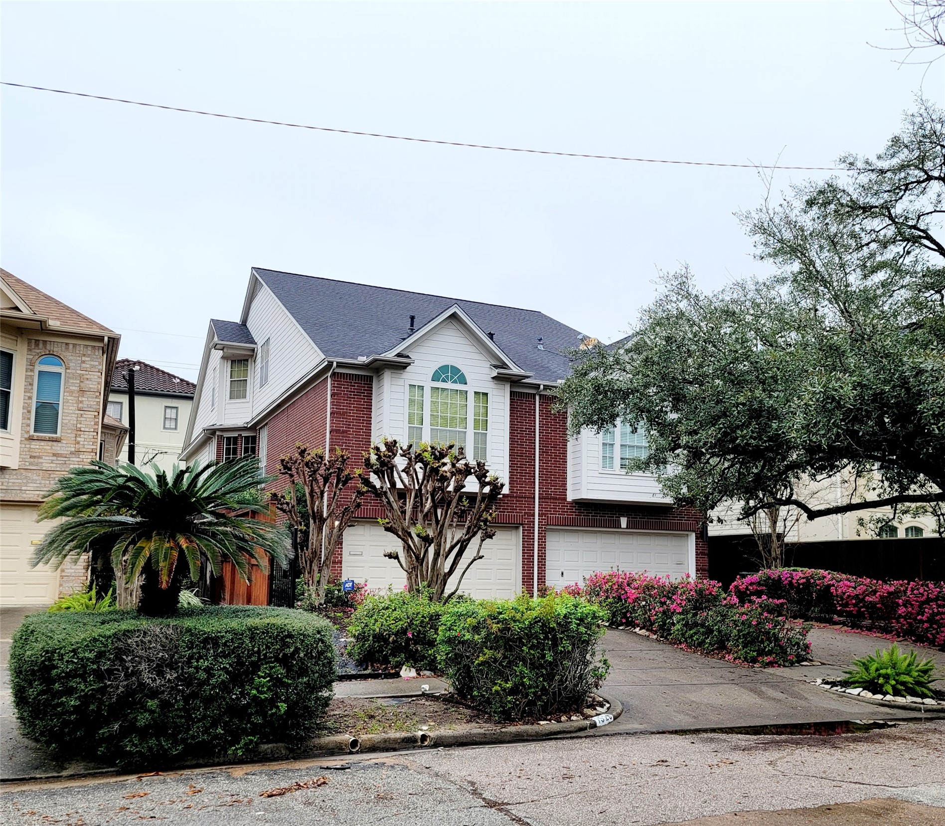 1526 Nevada Street Houston, TX 77006 - Photo 1 of 38 a front view of a house with a yard