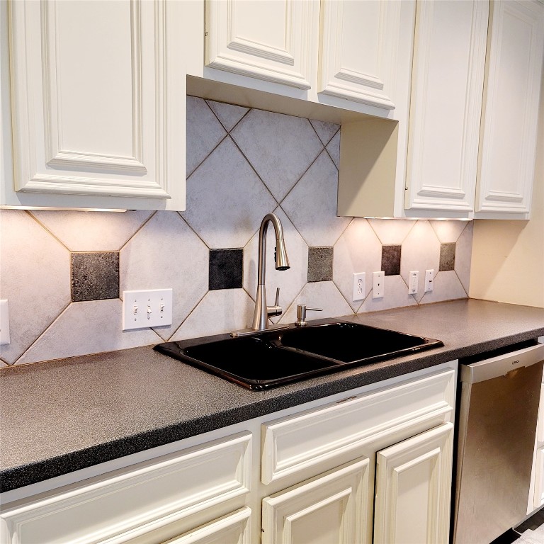 1526 Nevada Street Houston, TX 77006 - Photo 12 of 38 a kitchen with a sink and cabinets