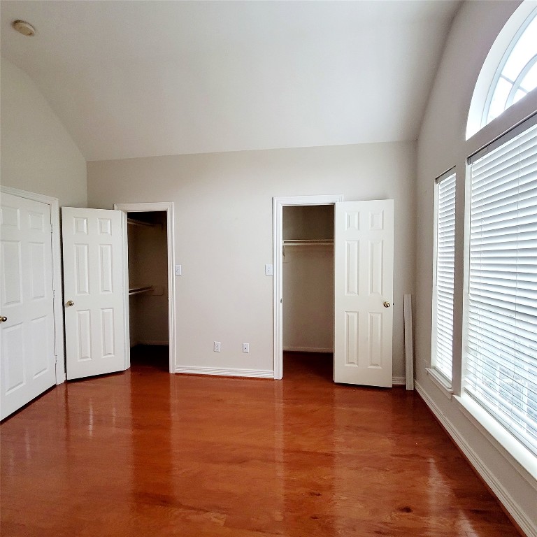 1526 Nevada Street Houston, TX 77006 - Photo 29 of 38 a view of an empty room with wooden floor and a window