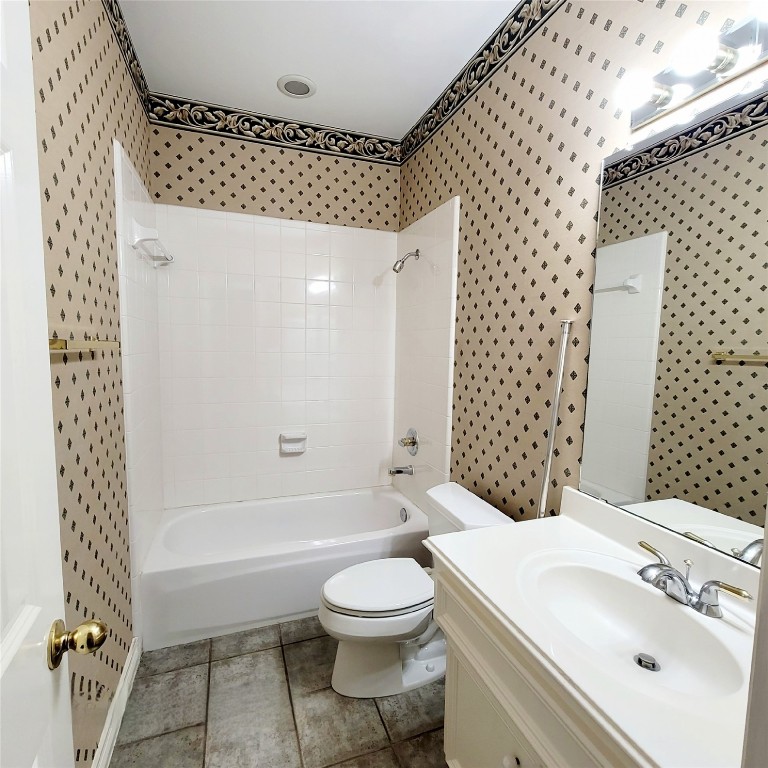 1526 Nevada Street Houston, TX 77006 - Photo 31 of 38 a bathroom with a sink a toilet and shower