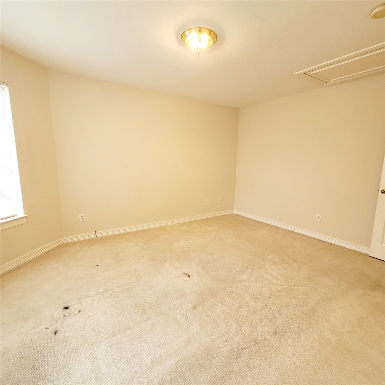 1526 Nevada Street Houston, TX 77006 - Photo 32 of 38 an empty room with a empty space and a window