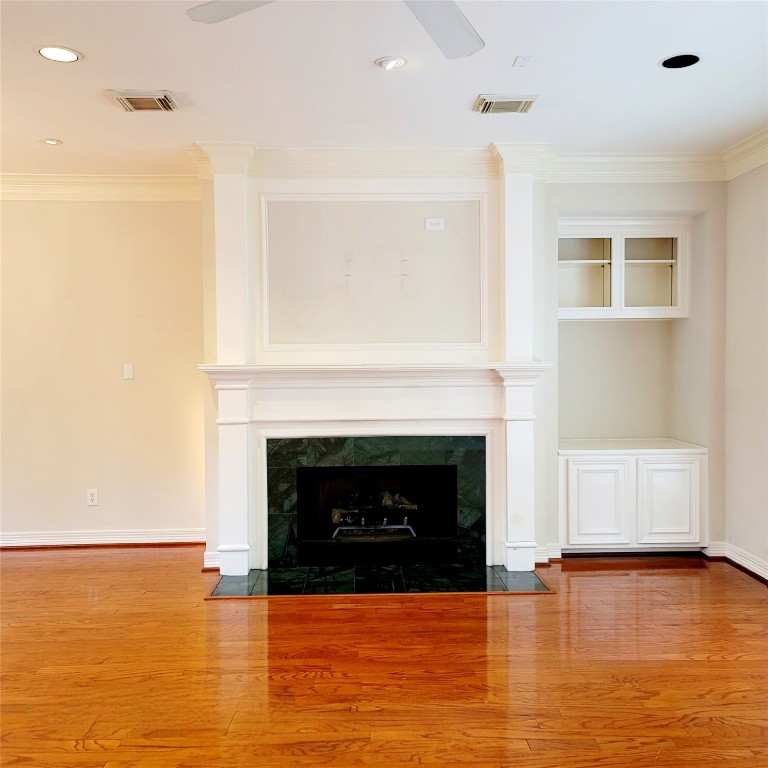 1526 Nevada Street Houston, TX 77006 - Photo 8 of 38 a view of a livingroom with a fireplace and a fireplace