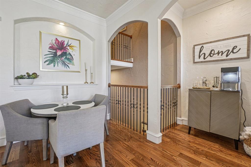 612 Rockingham Drive Irving, TX 75063 - Photo 11 of 39 a view of a dining room with furniture wooden floor and a front door