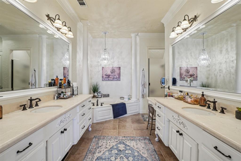 612 Rockingham Drive Irving, TX 75063 - Photo 30 of 39 a spacious bathroom with a double vanity sink mirror and double