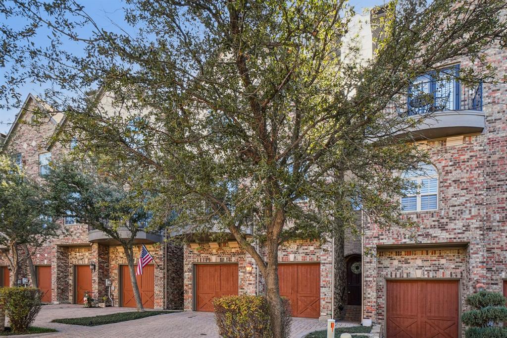 612 Rockingham Drive Irving, TX 75063 - Photo 3 of 39 a front view of a building with large trees