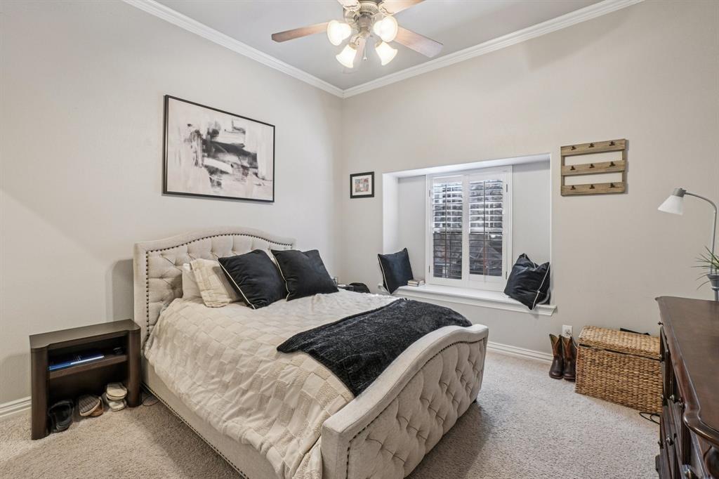 612 Rockingham Drive Irving, TX 75063 - Photo 33 of 39 a bedroom with bed and a window