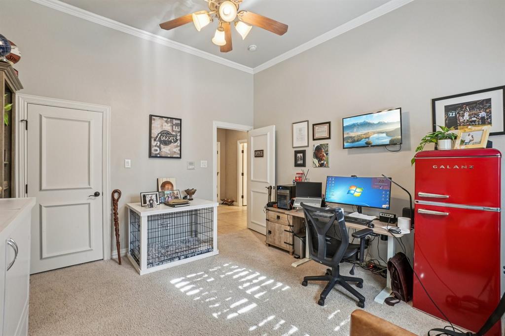 612 Rockingham Drive Irving, TX 75063 - Photo 37 of 39 a view of a workspace with furniture and a window