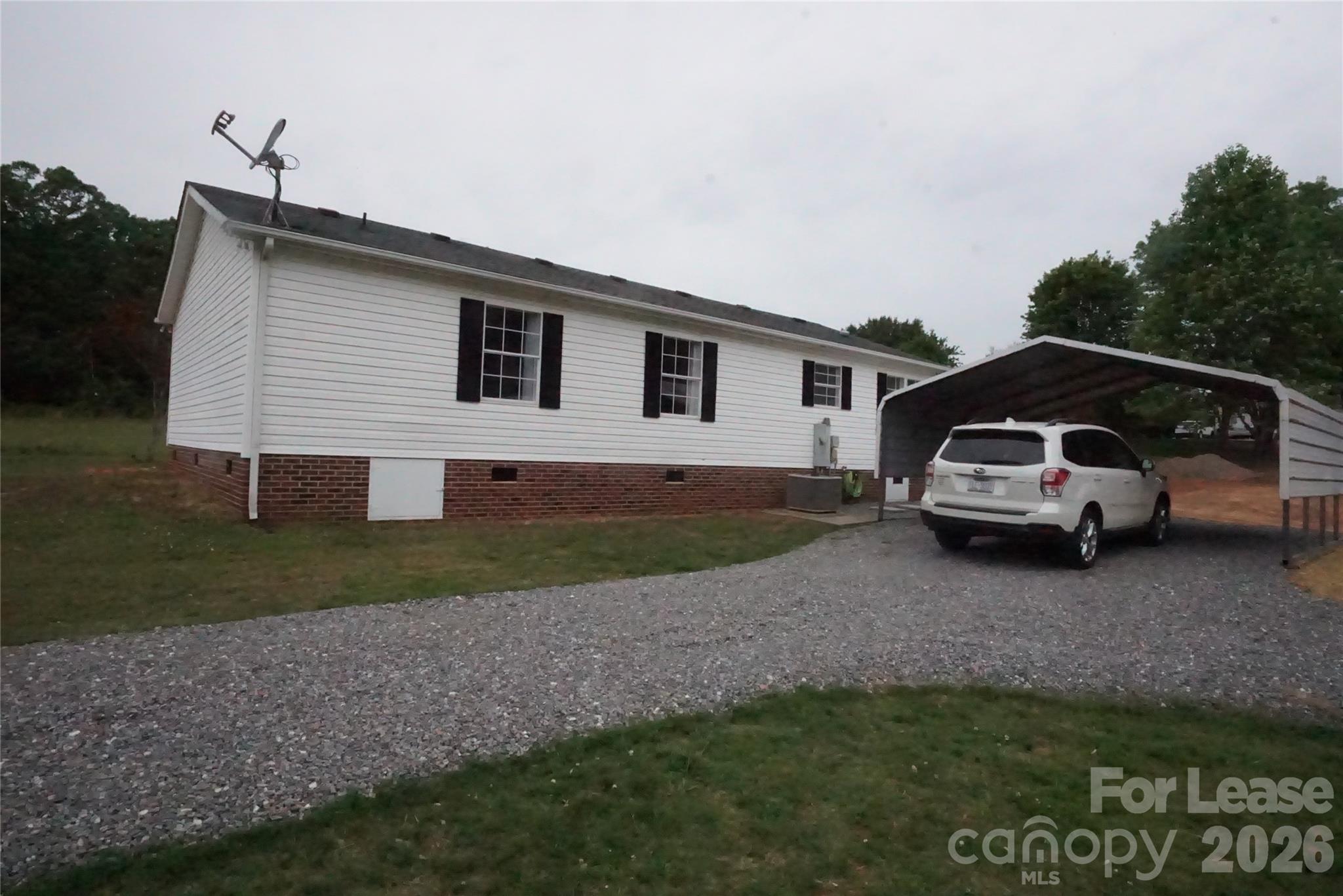 4550 Lee Cline Road Conover, NC 28613 - Photo 17 of 17 a house view with a garden space