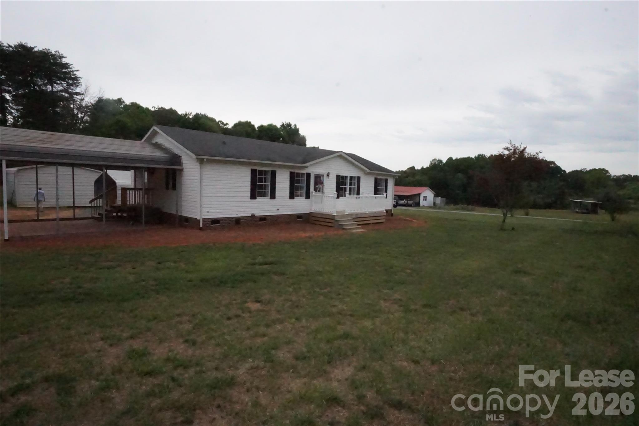 4550 Lee Cline Road Conover, NC 28613 - Photo 2 of 17 a view of a house with a big yard