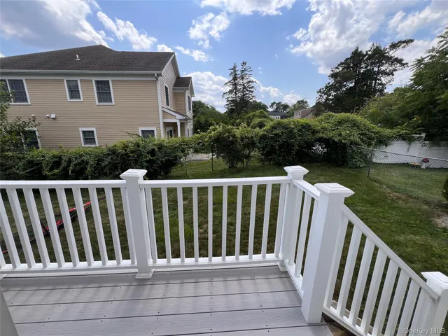 a view of a wooden fence