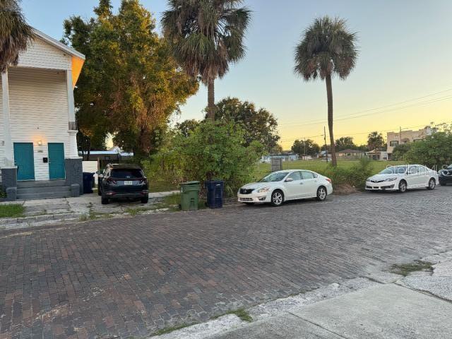 2328 West Cherry Street Tampa, FL 33607 - Photo 6 of 7 a car parked on the side of a street