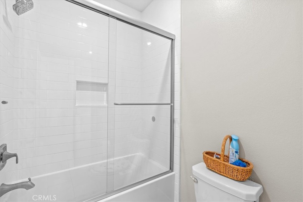 113 Source Irvine, CA 92618 - Photo 25 of 38 a bathroom with a shower