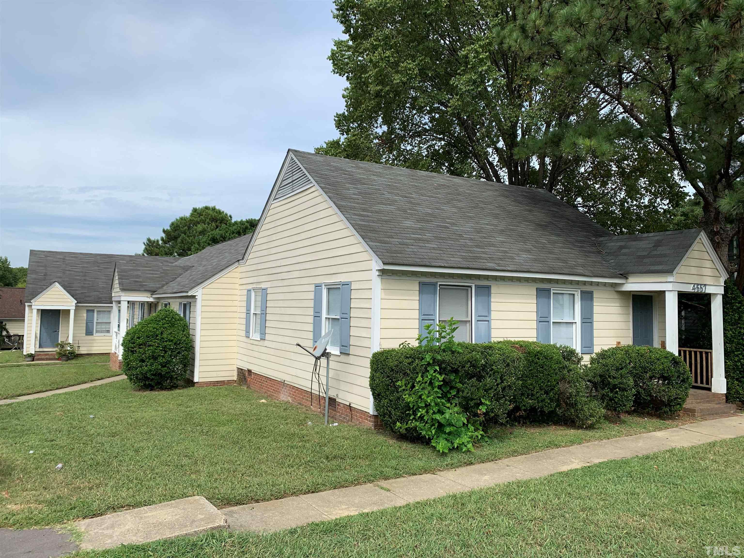 4557 Hargrove Road Raleigh, NC 27604 - Photo 2 of 16 a view of a house with a yard