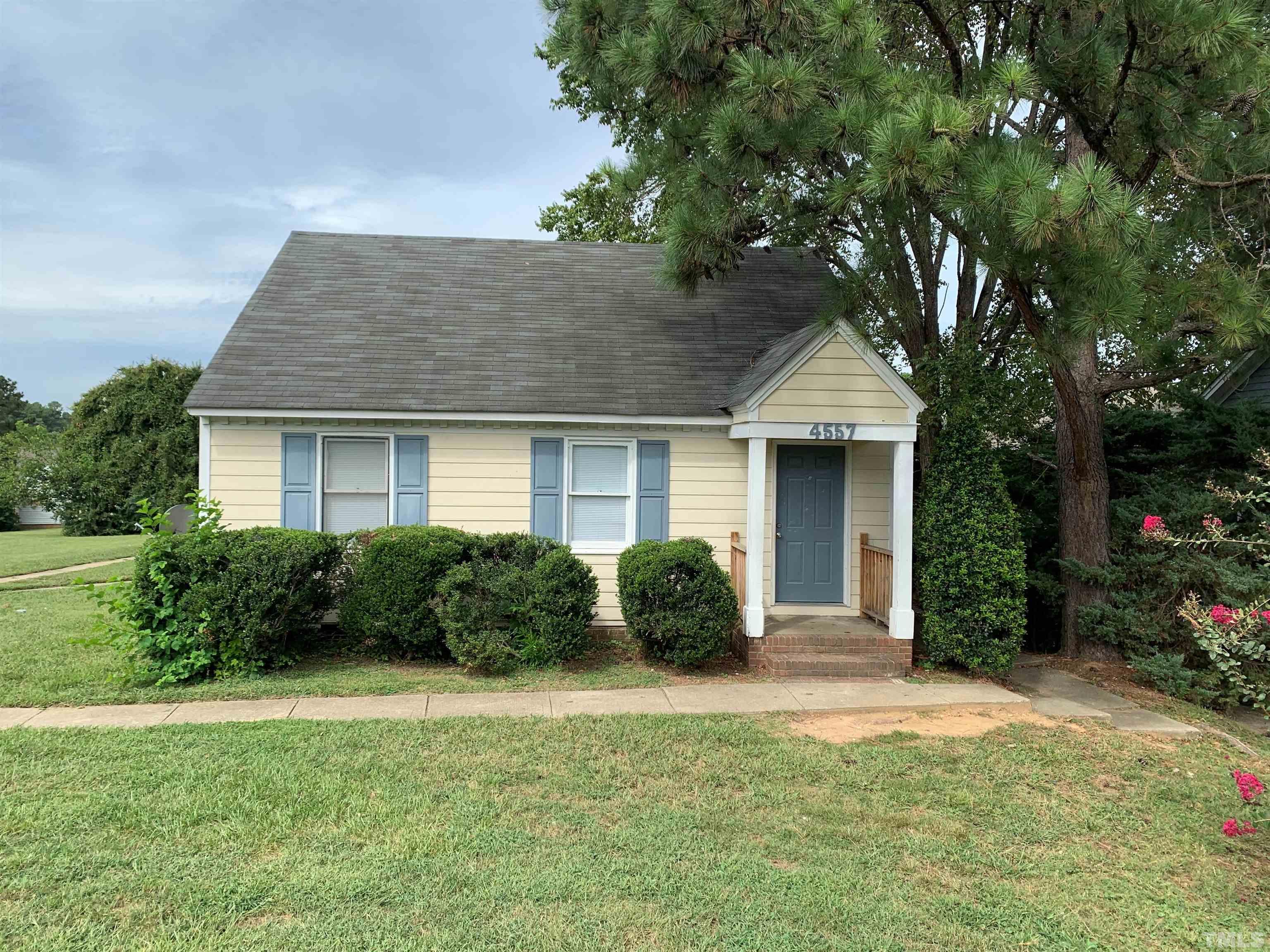 4557 Hargrove Road Raleigh, NC 27604 - Photo 3 of 16 a front view of a house with garden