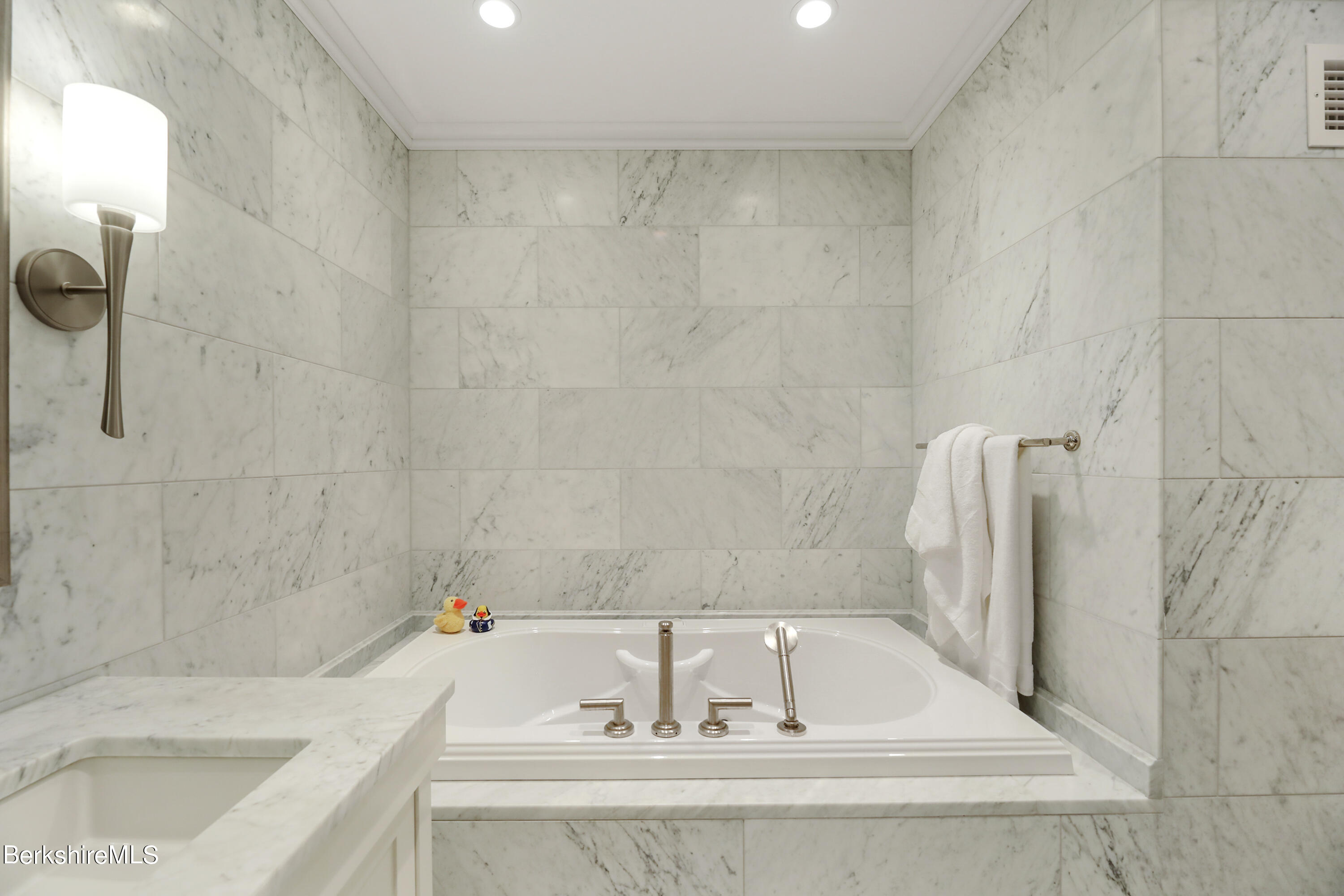 165 Kemble Street, Unit 16 Lenox, MA 01240 - Photo 19 of 31 a bathroom with a bathtub