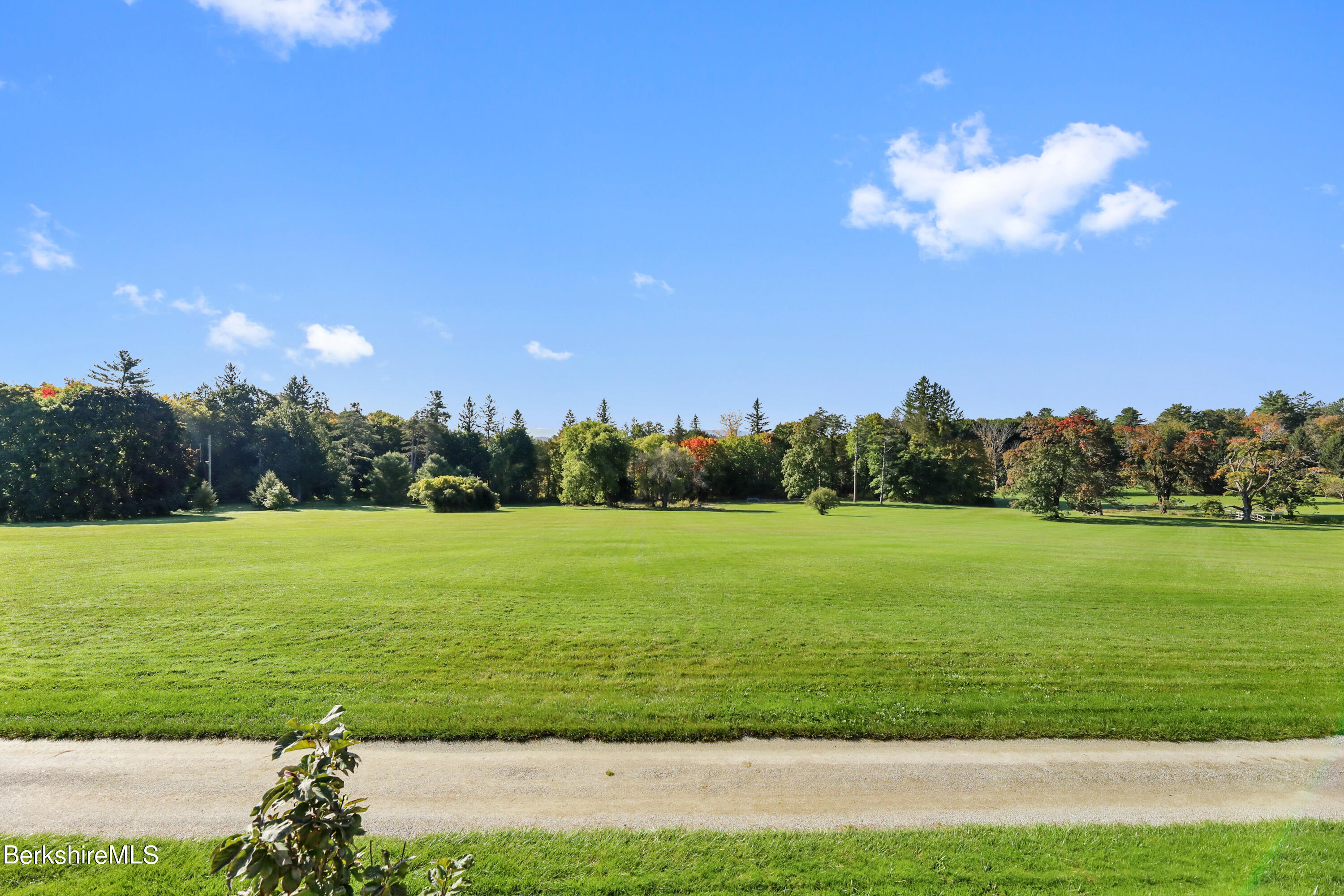 165 Kemble Street, Unit 16 Lenox, MA 01240 - Photo 30 of 31 a view of a field with an outdoor space
