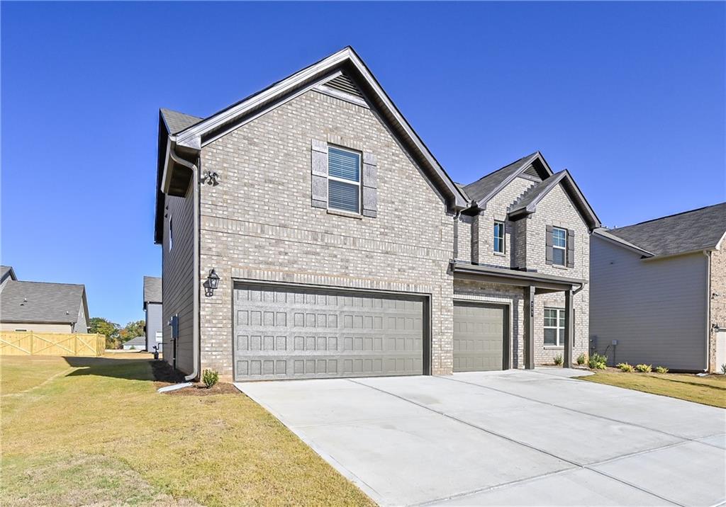 303 Eleanora Crossing Loganville, GA 30052 - Photo 2 of 49